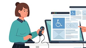 A woman uses an adaptive joystick while looking at a computer displaying a webpage with a wheelchair accessibility symbol.
